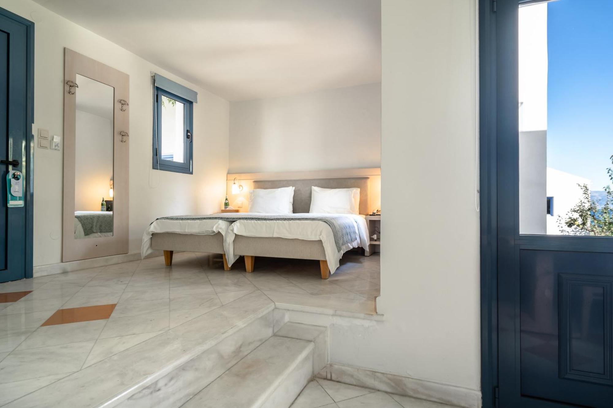 Porto Galini Seaside Resort & Spa นิเกียนา ภายนอก รูปภาพ A bedroom at the hotel